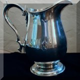 S21. Monogrammed sterling silver pitcher. 